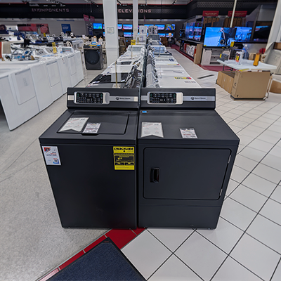 Appliance showroom at ABC Warehouse Fort Wayne featuring washers, dryers and other major appliances